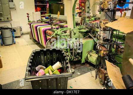 Modern weaving machine producing elaberate patterned textile for the World markets Stock Photo