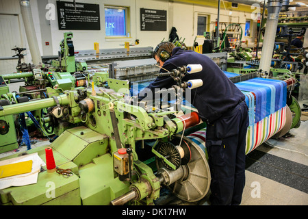 Modern weaving machine producing elaberate patterned textile for the World markets Stock Photo