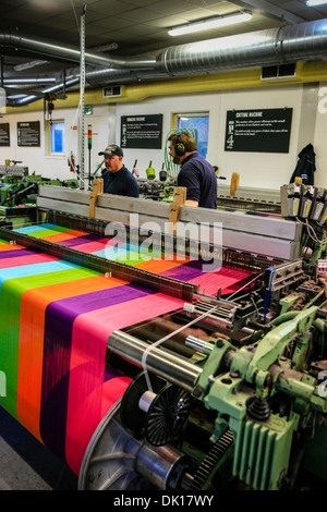 Modern weaving machine producing elaberate patterned textile for the World markets Stock Photo