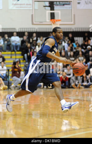 Jan. 20, 2011 - St. Bonaventure, New York, United States of America - Xavier Musketeers guard Tu Holloway (52) dribbles the ball up court in the first half against St. Bonaventure.  Xavier defeated St. Bonaventure 79-65 in front of 4,244 the Bob Lanier Court at the Reilly Center at St. Bonaventure, NY. (Credit Image: © Michael Johnson/Southcreek Global/ZUMAPRESS.com) Stock Photo