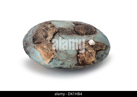 Modern sculpture by Jacques GALLON, ceramist.  Flat planet with white house. Stock Photo