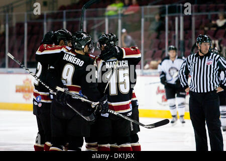 Jan. 23, 2011 - Las Vegas, Nevada, U.S - The Bakersfield Condors Forward Andrew Ianiero (#9), Center Adam Naglich (#15) and Defensemen Evan Stoflet (#2) celebrate after their goal during second period game action of the Bakersfield Condors at Las Vegas Wranglers game at the Orleans Arena in Las Vegas, Nevada.  The Bakersfield Condors lead the Las Vegas Wranglers 4-3 after two perio Stock Photo