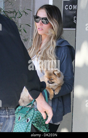 Petra Ecclestone leaving an office building Beverly Hills carrying her Pomeranian puppy Los Angeles California - 10.04.12 Stock Photo