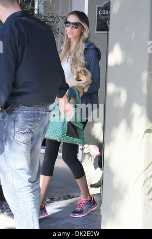 Petra Ecclestone leaving an office building Beverly Hills carrying her Pomeranian puppy Los Angeles California - 10.04.12 Stock Photo