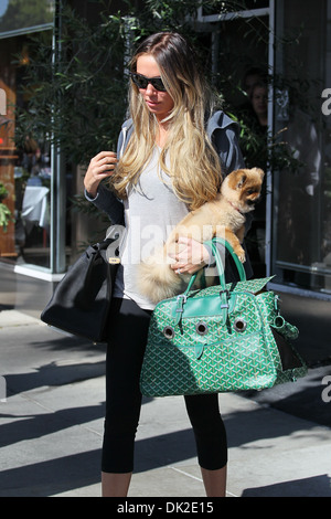 Petra Ecclestone leaving an office building Beverly Hills carrying her Pomeranian puppy Los Angeles California - 10.04.12 Stock Photo