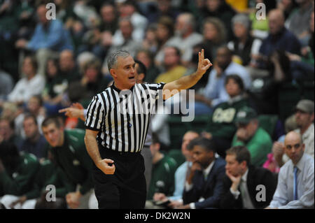 Feb. 19, 2011 - Fort Collins, Colorado, United States of America - A referee calls a foul. The UNLV Runnin' Rebels defeated the Colorado State Rams by a score of 68-61in a Mountain West conference matchup at Moby Arena. (Credit Image: © Andrew Fielding/Southcreek Global/ZUMAPRESS.com) Stock Photo