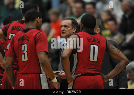 Feb. 19, 2011 - Fort Collins, Colorado, United States of America - UNLV Runnin' Rebels coach Lon Kruger talks to his team. The UNLV Runnin' Rebels defeated the Colorado State Rams by a score of 68-61in a Mountain West conference matchup at Moby Arena. (Credit Image: © Andrew Fielding/Southcreek Global/ZUMAPRESS.com) Stock Photo