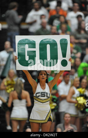 Feb. 19, 2011 - Fort Collins, Colorado, United States of America - A CSU cheerleader holds a sign saying ''GO!''. The UNLV Runnin' Rebels defeated the Colorado State Rams by a score of 68-61in a Mountain West conference matchup at Moby Arena. (Credit Image: © Andrew Fielding/Southcreek Global/ZUMAPRESS.com) Stock Photo