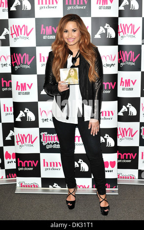 Demi Lovato signs copies of her new album 'Unbroken' at HMV Oxford Circus London England - 03.04.12 Stock Photo