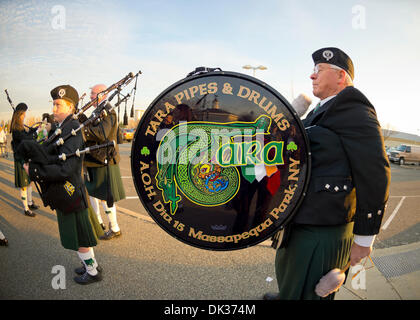 Garden City, New York, USA. December 1, 2013. Winter holiday event Festival of Trees includes musical entertainment including Tara Pipes & Drums, A.O.H. Division 15, of Massapequa Park, which played bagpipe music outdoors. The event was held at Cradle of Aviation Museum during Thanksgiving weekend, with proceeds benefiting United Cerebral Palsy Association of Nassau County, Long Island. Credit:  Ann E Parry/Alamy Live News Stock Photo