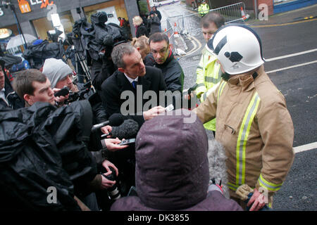 Glasgow, UK. 2nd Dec, 2013. Scottish Fire and Rescue Service Assistant Chief Officer David Goodhew briefs the media on Day 3 of the rescue and recovery operation at the Clutha Bar in Glasgow. A police helicopter crashed into the building on Friday night killing at least nine people. Credit:  ALAN OLIVER/Alamy Live News Stock Photo