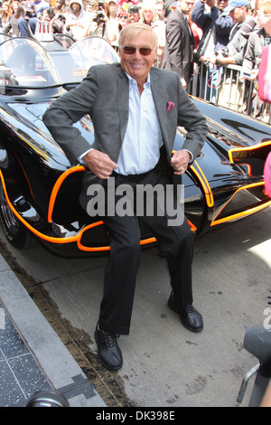 Adam West sitting on Batmobile Adam West is honored with a star on Hollywood Walk of Fame on Hollywood Blvd Los Angeles Stock Photo