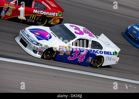 Mar. 6, 2011 - Las Vegas, Nevada, U.S - David Gilliland, driver of the #34 Taco Bell Ford Fusion, tries to get by Jamie McMurray, driver of the #1 McDonald's Chevrolet Impala during race action in the NASCAR Sprint Cup Series Kobalt Tools 400 at Las Vegas Motor Speedway in Las Vegas, Nevada. (Credit Image: © Matt Gdowski/Southcreek Global/ZUMAPRESS.com) Stock Photo