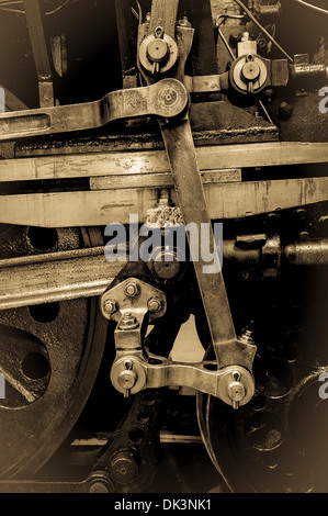 Detail of a steam train wheel assembly. The front bogie is just to the right of the frame. Stock Photo