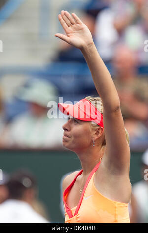 Mar. 14, 2011 - Indian Wells, California, U.S - Maria Sharapova (RUS) waives to the crowd after her match at the 2011 BNP Paribas Open held at the Indian Wells Tennis Garden in Indian Wells, California. Sharapova won with a score of 6-2, 6-2. (Credit Image: © Gerry Maceda/Southcreek Global/ZUMAPRESS.com) Stock Photo