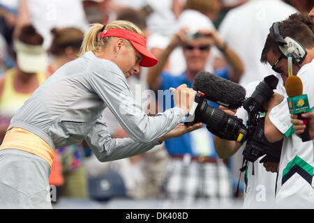 Mar. 14, 2011 - Indian Wells, California, U.S - Maria Sharapova (RUS) signs the lens of a television camera after her match at the 2011 BNP Paribas Open held at the Indian Wells Tennis Garden in Indian Wells, California. Sharapova won with a score of 6-2, 6-2. (Credit Image: © Gerry Maceda/Southcreek Global/ZUMAPRESS.com) Stock Photo