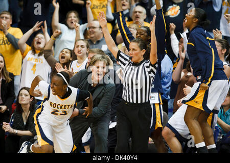 Mar. 16, 2011 - Toledo, Ohio, U.S - Toledo head coach Tricia Cullop, players, and fans celebrate guard Andola Dortch's (#22) game-winning three-pointer in the closing seconds of the game.  The Toledo Rockets, of the Mid-American Conference, defeated the Delaware Blue Hens, of the Colonial Athletic Association, 58-55 in the first round game of the 2011 Women's National Invitational  Stock Photo