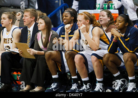 Mar. 16, 2011 - Toledo, Ohio, U.S - Toledo forward Melissa Goodall (#32) and her teammates watch the action on the court during second-half game action.  The Toledo Rockets, of the Mid-American Conference, defeated the Delaware Blue Hens, of the Colonial Athletic Association, 58-55 in the first round game of the 2011 Women's National Invitational Tournament being played at Savage A Stock Photo