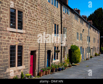 Traditional stone cottages built for workers at Cromford Mill Derbyshire UK  during industrial  revolution by Richard Arkwright Stock Photo