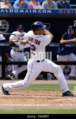 Mar. 26, 2011 - Port St. Lucie, Florida, U.S - New York Mets right fielder Scott Hairston (12) gets a hit against the Atlanta Braves during a Grapefruit League Spring Training game at Tradition Field in Port St. Lucie, FL. Mets defeated Braves 8-2. (Credit Image: © Debby Wong/Southcreek Global/ZUMAPRESS.com) Stock Photo