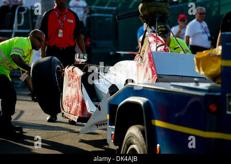 Mar. 27, 2011 - St.Petersburg, Florida, U.S - IZOD IndyCar driver James Jakes of Dale Coyne Racing (18) has his car towed from the track back to the paddock after crashing during IndyCar warm up at the Honda Grand Prix of St. Petersburg. (Credit Image: © Luke Johnson/Southcreek Global/ZUMApress.com) Stock Photo