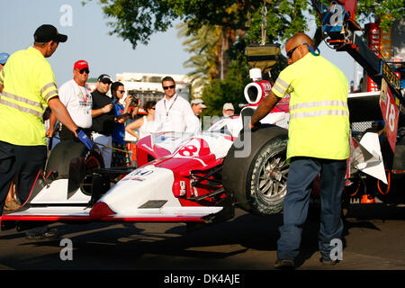 Mar. 27, 2011 - St.Petersburg, Florida, U.S - IZOD IndyCar driver James Jakes of Dale Coyne Racing (18) has his car towed from the track back to the paddock after crashing during IndyCar warm up at the Honda Grand Prix of St. Petersburg. (Credit Image: © Luke Johnson/Southcreek Global/ZUMApress.com) Stock Photo