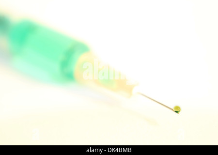 The drop of poison on top of needle Stock Photo