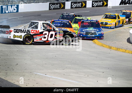 Apr. 2, 2011 - Martinsville, Virginia, U.S - At the Nascar Camping World Truck Series Kroger 250,  Camping World Truck Series driver Todd Bodine (30) gets sideways with Camping World Truck Series driver Kevin Harvick (2) right behind.Johnny Sauter won the event with two laps left after bumping Kyle Busch for the win. (Credit Image: © Jim Dedmon/Southcreek Global/ZUMAPRESS.com) Stock Photo