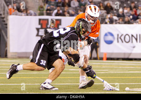 Apr. 3, 2011 - East Rutherford, New Jersey, U.S - Syracuse Orange attacker Tommy Palasek (14) and Duke Blue Devils midfielder Terrence Molinari (32) in lacrosse action during the Konica Minolta Big City Classic at The New Meadowlands Stadium in East Rutherford, NJ. Syracuse defeated Duke 13-11. (Credit Image: © Debby Wong/Southcreek Global/ZUMAPRESS.com) Stock Photo