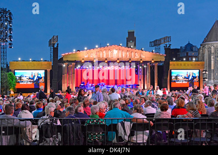 Maastricht Vrijthof Square André Rieu music concert interval July warm summer dusk evening temporary stage seating for fans in Limburg Netherlands EU Stock Photo