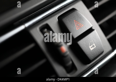 Detail of a warning button in a car Stock Photo