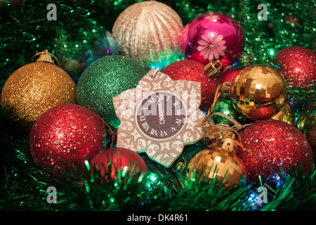 Christmas decorations ornaments baubles colorful balls ball round clock midnight sparkles close-up Stock Photo