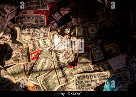 Dollar bills on the wall in Salty Dawg Saloon on The Spit, Homer, Alaska, USA Stock Photo