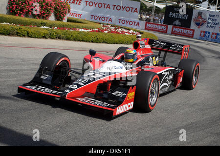 Apr. 17, 2011 - Long Beach, California, United States of America - Justin Wilson driver of the #22 ZLine Furniture car, speeds out of turn four during the Izod Indy Series Race through the streets of Long Beach, California.  Wilson would go on to finish the race in 22nd place overall. (Credit Image: © Tony Leon/Southcreek Global/ZUMAPRESS.com) Stock Photo