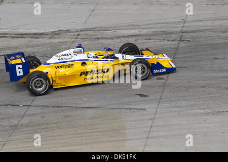 Apr. 17, 2011 - Long Beach, California, United States of America - Ryan Briscoe driver of the #6 Penske car speeds out of turn 5 during the Izod Indy Series Race through the streets of Long Beach, California.  Briscoe would go on to finish the 1.96 mile street course race in second place. (Credit Image: © Tony Leon/Southcreek Global/ZUMAPRESS.com) Stock Photo