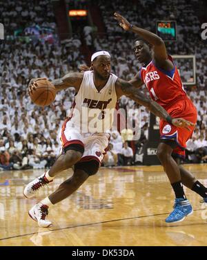Apr. 18, 2011 - Miami, Florida, U.S. -  MIAMI, FL - AMERICAN AIRLINES ARENA - HEAT vs SIXERS - R1G2 - Miami Heat small forward LeBron James (6) works his way around Philadelphia 76ers point guard Jrue Holiday (11) during Monday night's playoff game at American Airlines Arena. (Credit Image: © Damon Higgins/The Palm Beach Post/ZUMAPRESS.com) Stock Photo