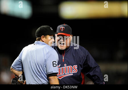 Apr. 18, 2011 - Baltimore, Maryland, U.S - Minnesota Twins manager Ron Gardenhire (right) argues with home plate umpire Chris Guccione (left)during a game between the Baltimore Orioles and the Minnesota Twins, the Twins defeated the Orioles 5-3 (Credit Image: © TJ Root/Southcreek Global/ZUMApress.com) Stock Photo