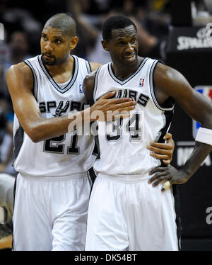 Apr. 20, 2011 - San Antonio, TX, USA - San Antonio Spurs forward Tim Duncan checks on teammate Antonio McDyess during a San Antonio Spurs playoff game against the Memphis Grizzlies Wednesday, April 20, 2011 at the AT&T Center in San Antonio..Photo/Bahram Mark Sobhani (Credit Image: © Mark Sobhani/ZUMAPRESS.com) Stock Photo