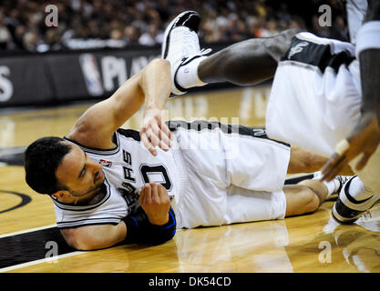 Apr. 20, 2011 - San Antonio, TX, USA - San Antonio Spurs guard Manu Ginobili of Argentina falls during a San Antonio Spurs playoff game against the Memphis Grizzlies Wednesday, April 20, 2011 at the AT&T Center in San Antonio..Photo/Bahram Mark Sobhani (Credit Image: © Mark Sobhani/ZUMAPRESS.com) Stock Photo