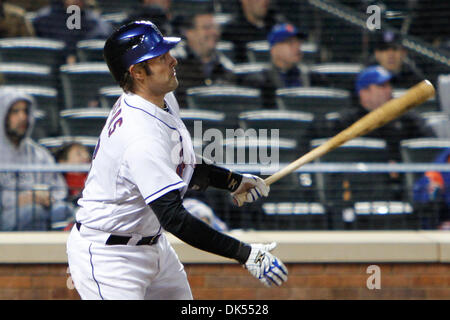 Apr. 21, 2011 - Corona, New York, U.S - New York Mets catcher Mike Nickeas (13) hits a homerun in the bottom of the third inning against the Houston Astros at Citi Field in Corona, NY. (Credit Image: © Debby Wong/Southcreek Global/ZUMAPRESS.com) Stock Photo