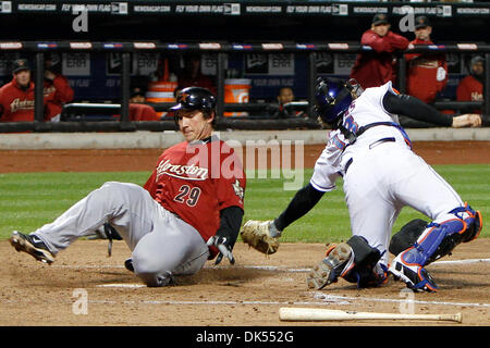 Apr. 21, 2011 - Corona, New York, U.S - Houston Astros first baseman Brett Wallace (29) scores against New York Mets catcher Mike Nickeas (13) in the seventh inning at Citi Field in Corona, NY. New York Mets defeat the Houston Astros 9-1. (Credit Image: © Debby Wong/Southcreek Global/ZUMAPRESS.com) Stock Photo