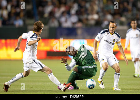 Apr. 23, 2011 - Carson, California, U.S - Portland Timbers midfielder Kalif Alhassan #11 (L) and Los Angeles Galaxy forward Landon Donovan #10 (R) fight for the ball during the Major League Soccer game between the Portland Timbers and the Los Angeles Galaxy at the Home Depot Center. The Galaxy went on to defeat the Timbers with a final score of 3-0. (Credit Image: © Brandon Parry/S Stock Photo