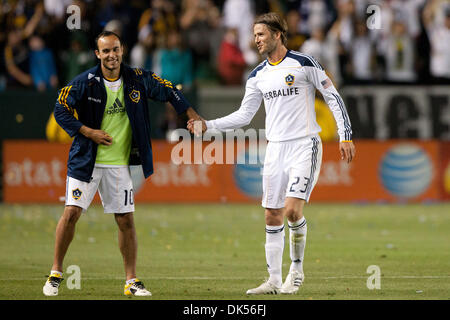 Apr. 23, 2011 - Carson, California, U.S - Los Angeles Galaxy midfielder David Beckham #23 shakes hands with Los Angeles Galaxy forward Landon Donovan #10 after the Major League Soccer game between the Portland Timbers and the Los Angeles Galaxy at the Home Depot Center. The Galaxy went on to defeat the Timbers with a final score of 3-0. (Credit Image: © Brandon Parry/Southcreek Glo Stock Photo