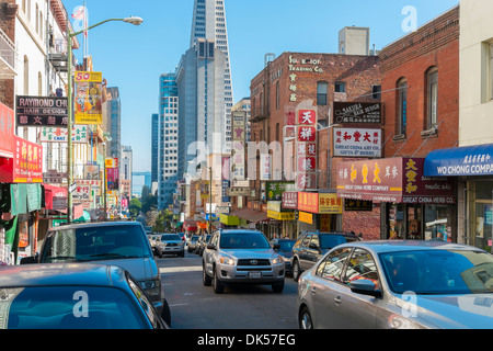 Chinatown San Francisco at Clay Street with several colorful store fronts and Chinese advertising signs. Stock Photo