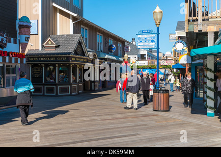 Busy day with tourists visiting the stores at Pier 39, Fisherman's Wharf, San Francisco, California, USA. Stock Photo