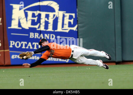 Center fielder Aaron Rowand makes a sliding catch on a ball hit by