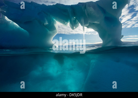 Antarctica, Underwater view of arched Iceberg floating near Enterprise Island on sunny spring morning along Antarctic Peninsula Stock Photo