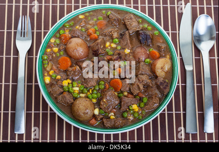 Hearty and traditional Irish stew in a bowl ready to eat. Stock Photo