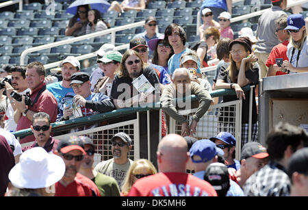 May 8, 2011 - Albuquerque, New Mexico, U.S. - 050811-- A fan invites Bryan  Cranston, from Breaking Bad to have dinner with her during the celebrity  softball game at Isotopes Park, Sunday