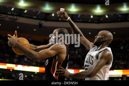 May 9, 2011 - Boston, Massachusetts, U.S. - Miami Heat center JOEL ANTHONY grabs a rebound in front of Boston Celtics forward KEVIN GARNETT during the fourth quarter of their playoff game. Heat beat the Celtics 98-90. (Credit Image: © Michael Laughlin/Sun-Sentinel/ZUMAPRESS.com) Stock Photo